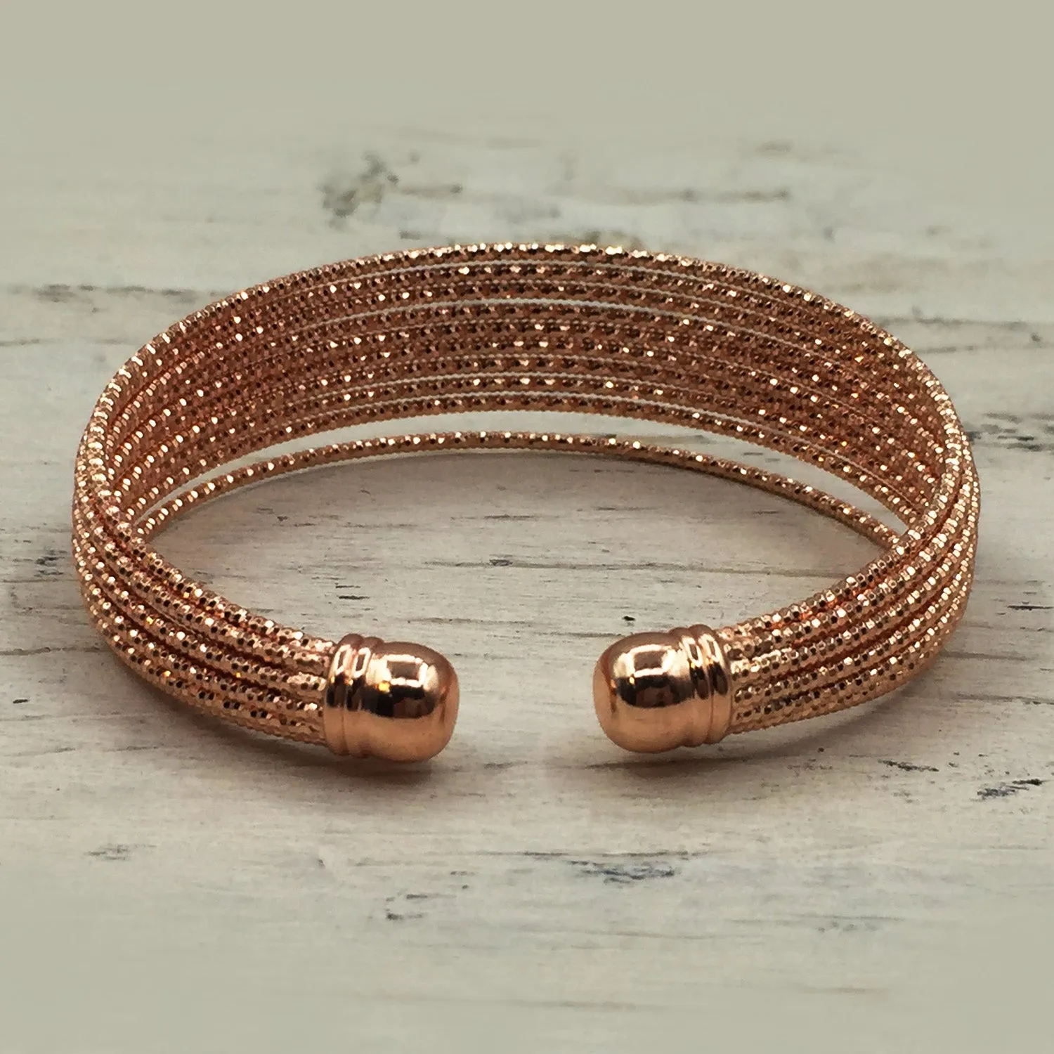 Delicate open rope style bangle